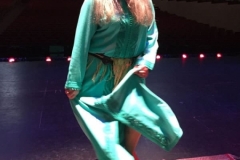 Aisha Ali dancing on an oil can during the production of Jornada.
